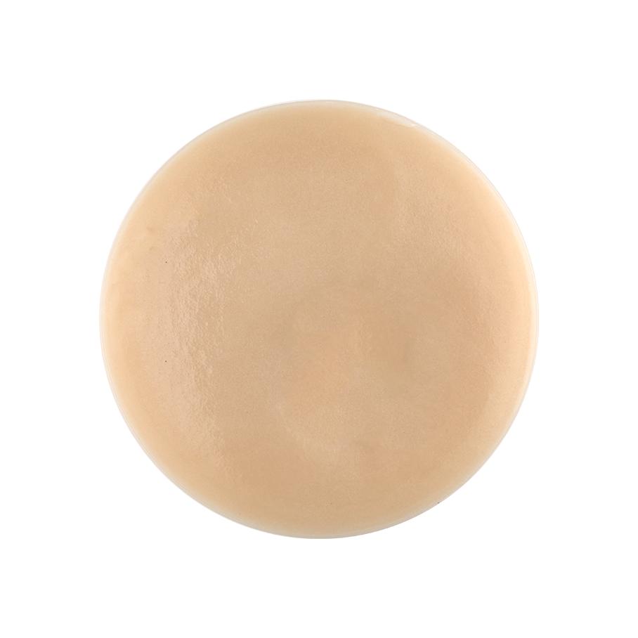 Soother. A perfectly circular swatch of a pale beige, matte, toothpaste.